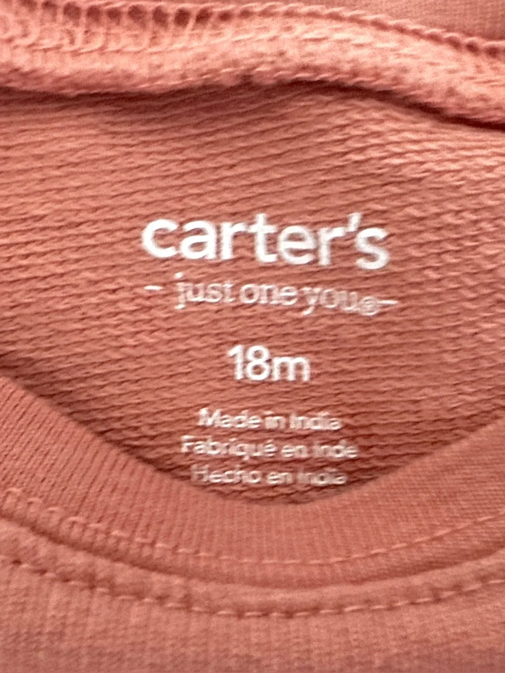 Carter's girl’s sweatshirt, small glittery heart on the chest. Size 18M.